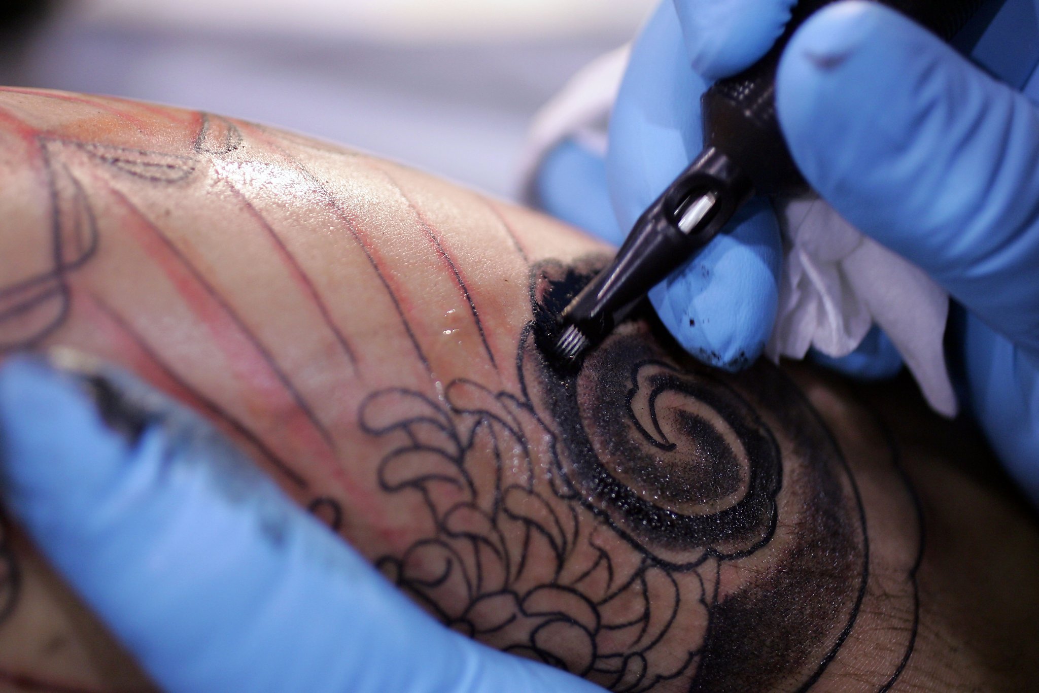 Tattoo fan shows off whopping ink bubble wobbling on her arm after latest  body art  and says its totally normal  The US Sun