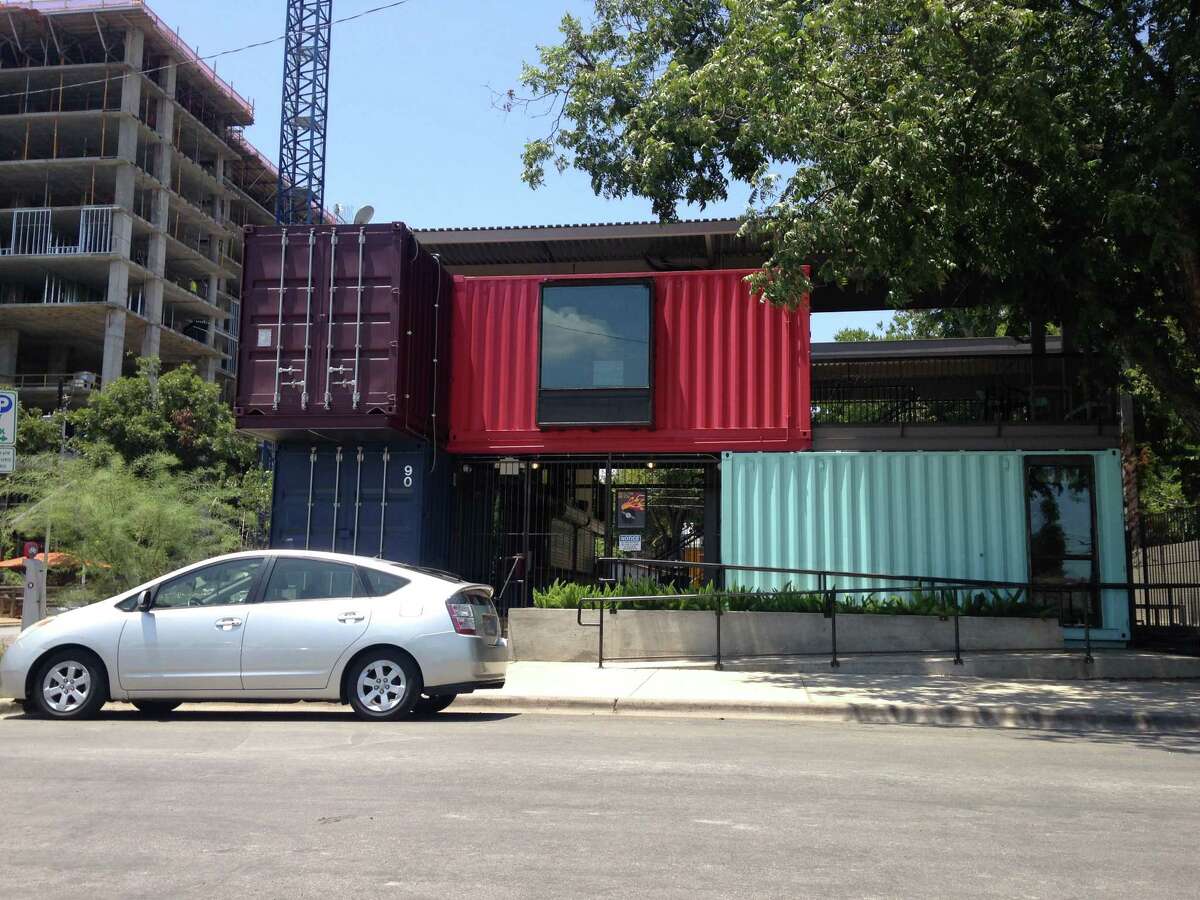 Each container at The Container Bar in Austin is painted a different color and has a different interior design.