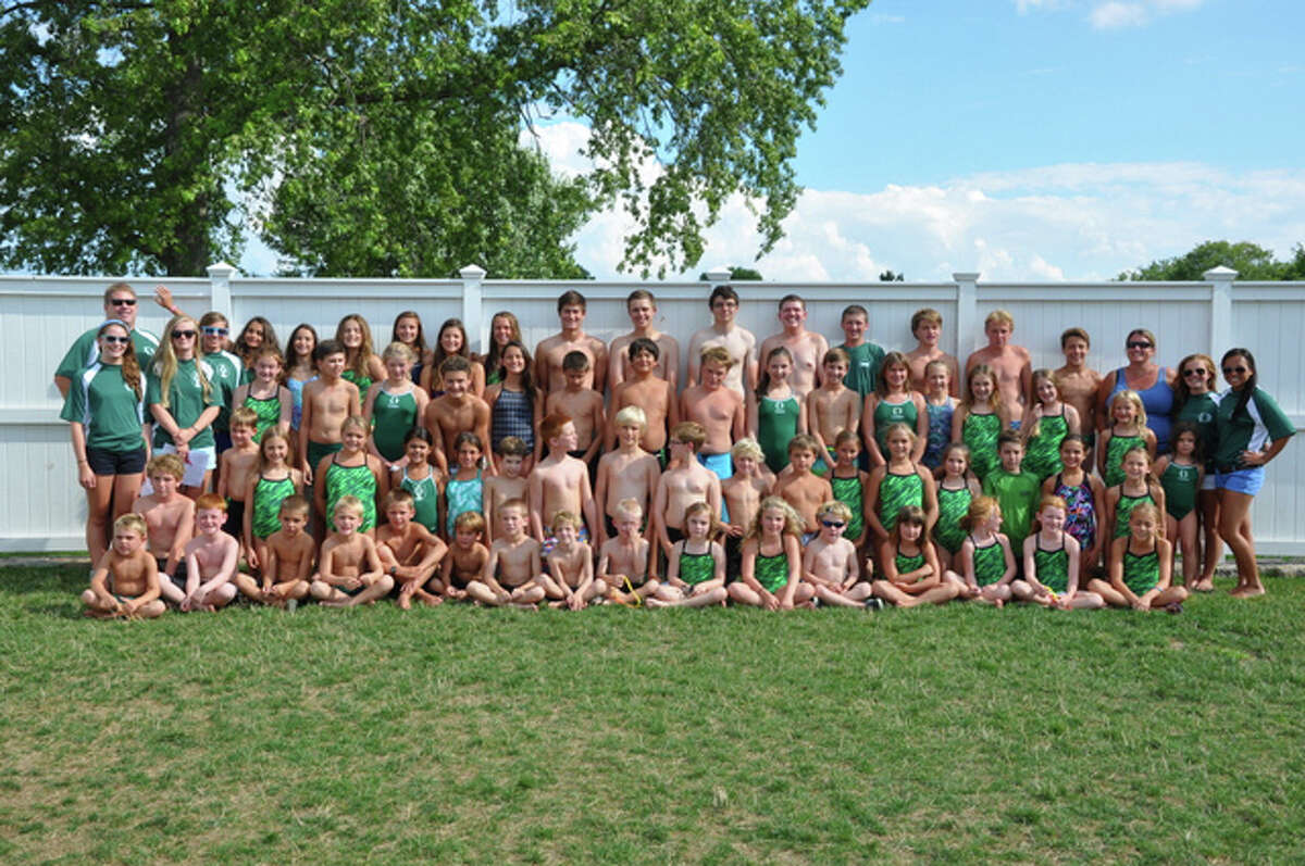 The Country Club of Darien swimming and diving team poses after finishing its season 6-0 and winning its division this 2014 summer.