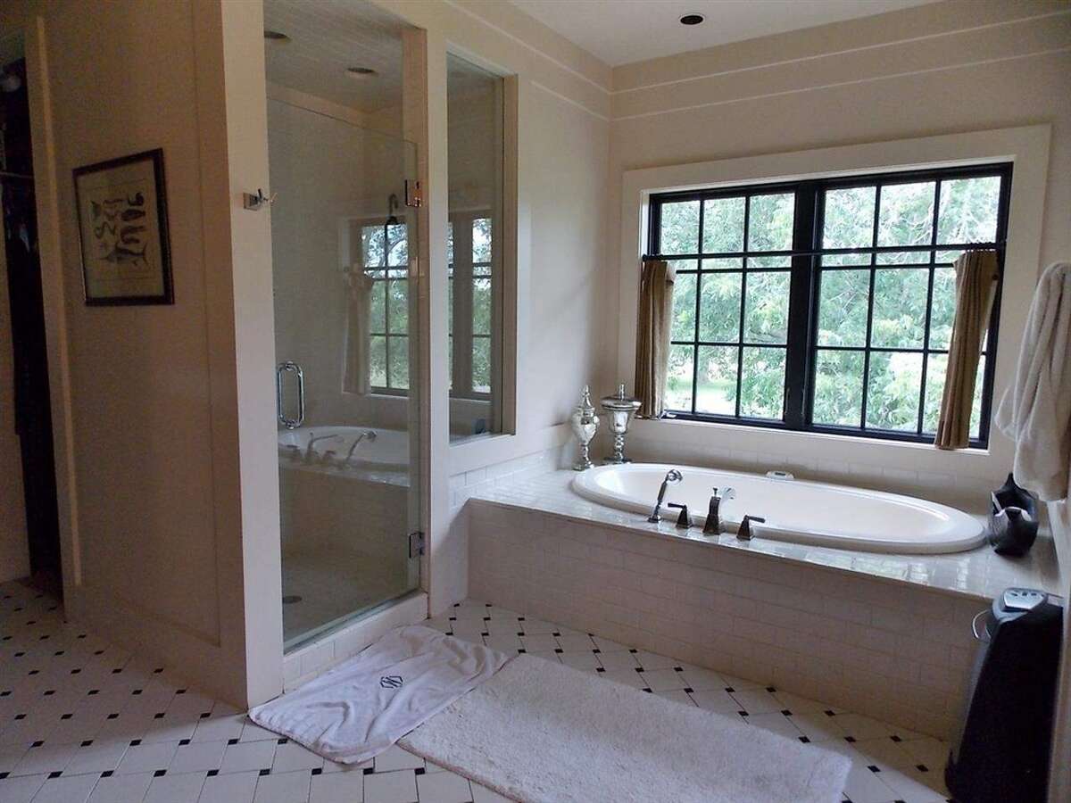 Relax in this waterfront Beaumont home with dock