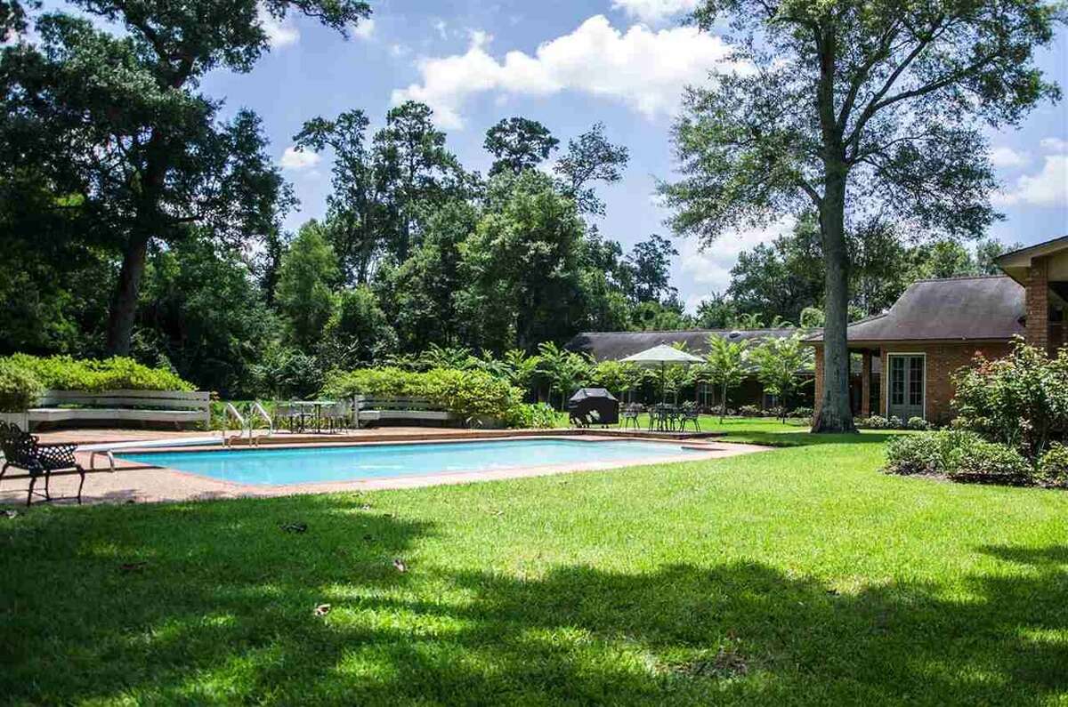 Relax in this waterfront Beaumont home with dock