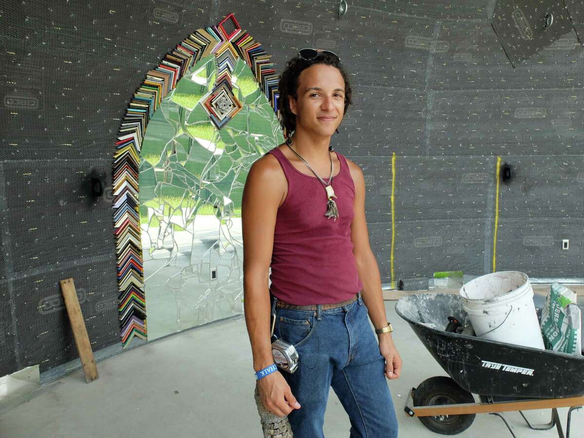 Artist Matt Gifford is covering the amphitheater at Smither Park with a mosaic of found objects. When completed, the structure will resemble the mouth of a large angler fish.
