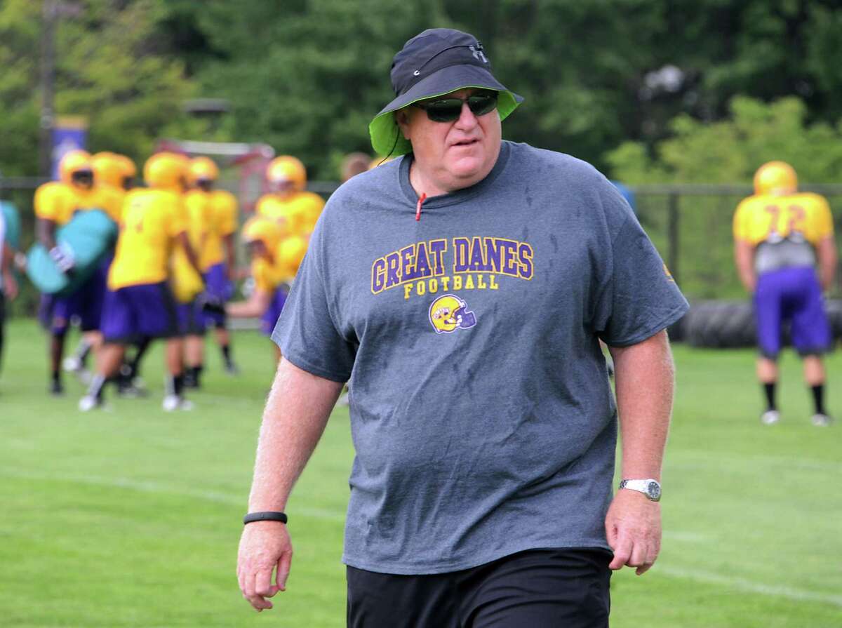 UAlbany's new football coach Greg Gattuso leads his team through a practice on Thursday, Aug. 7, 2014 in Albany, N.Y. (Lori Van Buren / Times Union)