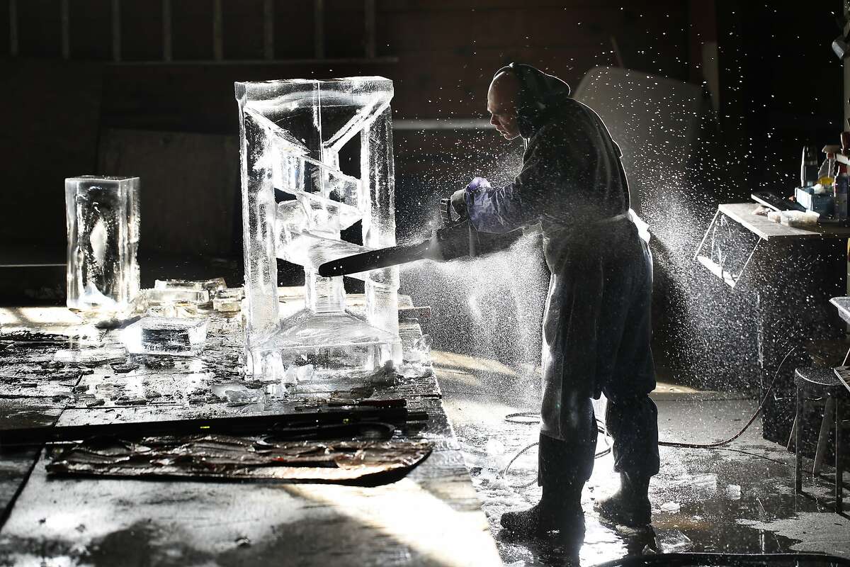 Master ice sculptor Anthony Soriano digs into a 300 pound block of ice at the San Francisco Ice Company in San Francisco, Calif. Soriano started carving wood when he was 16-years-old in the Philippines and shortly after took and interest in ice sculpting and the culinary arts.