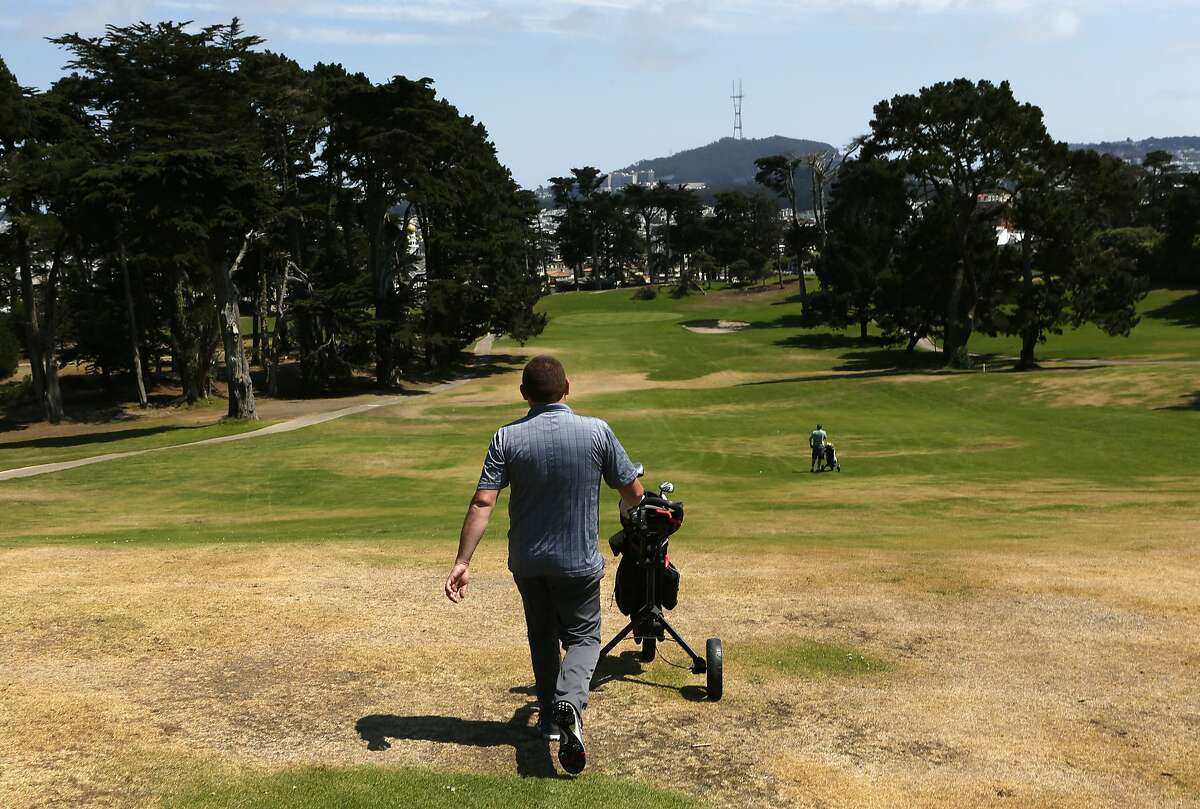 Tommy Noonan from Clare, Ireland walks up a fairway while playing golf at Lincoln Park golf course in San Francisco, Calif. on Monday, August 11, 2014.