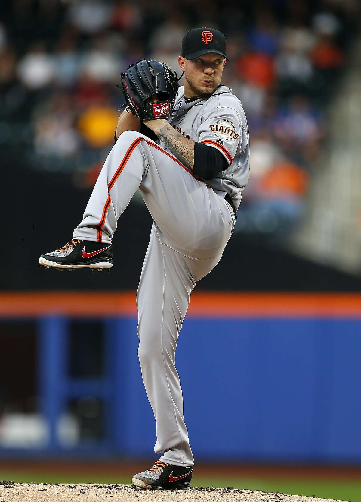 NEW YORK, NY - AUGUST 2: Jake Peavy #43 of the San Francisco Giants delivers a pitch against the New York Mets in the first inning on August 2, 2014 at Citi Field in the Flushing neighborhood of the Queens borough of New York City. (Photo by Rich Schultz/Getty Images)