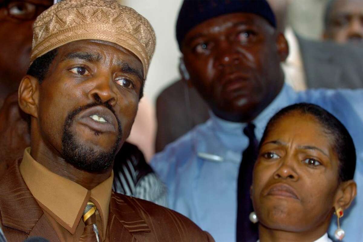 Ernest Newton III announces his intention to resign as state Senator on the steps of Bridgeport City Hall on Sept. 15th, 2005. He is seen here with his sister Patricia Newton-Foster.