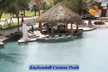 World S Largest Backyard Swimming Pool Gives Texas Home A Tropical
