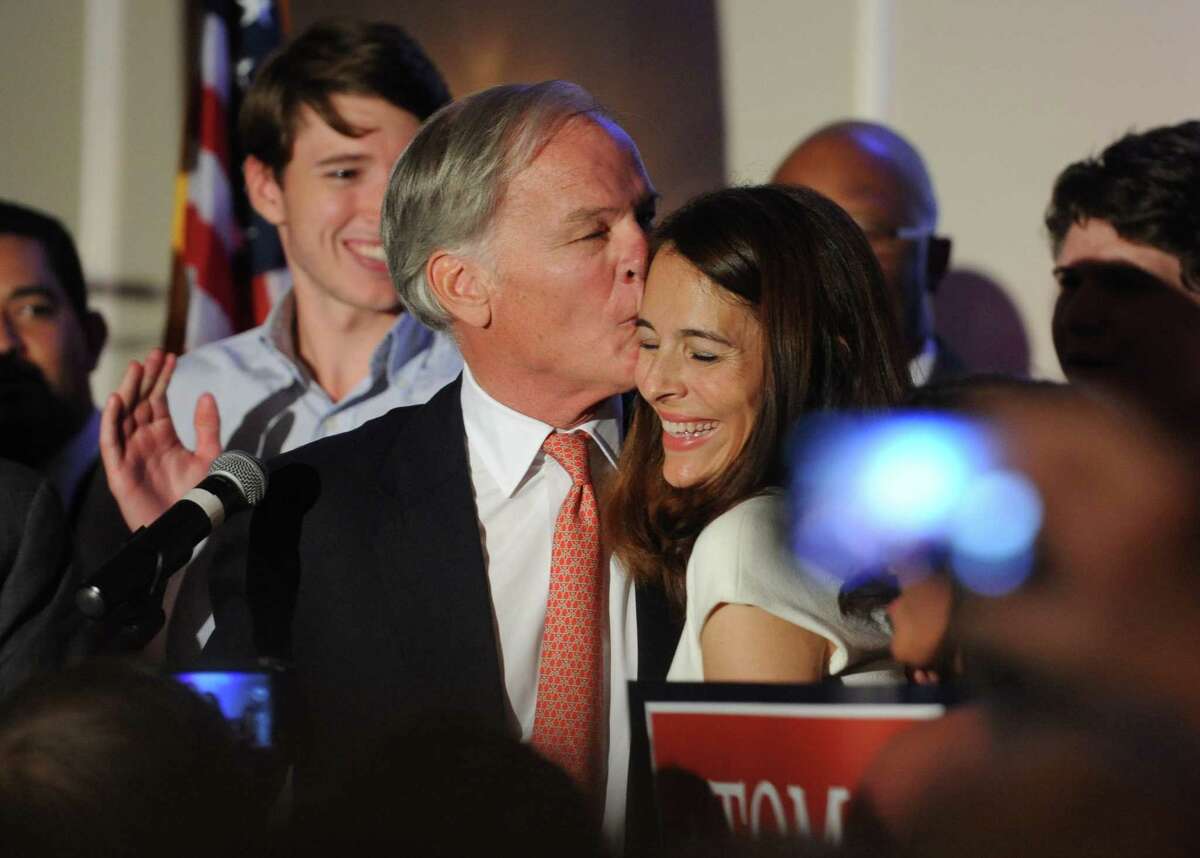Tom Foley, of Greenwich, kisses his wife Leslie after hearing the results of the 2014 Republican gubernatorial primary election at the Pontelandolfo Community Club in Waterbury, Conn. Tuesday, Aug. 12, 2014. Foley, former U.S. Ambassador to Ireland, defeated John McKinney and will run against incumbent Democratic Gov. Dannel P. Malloy in the 2014 Connecticut gubernatorial election on Nov. 4, 2014.