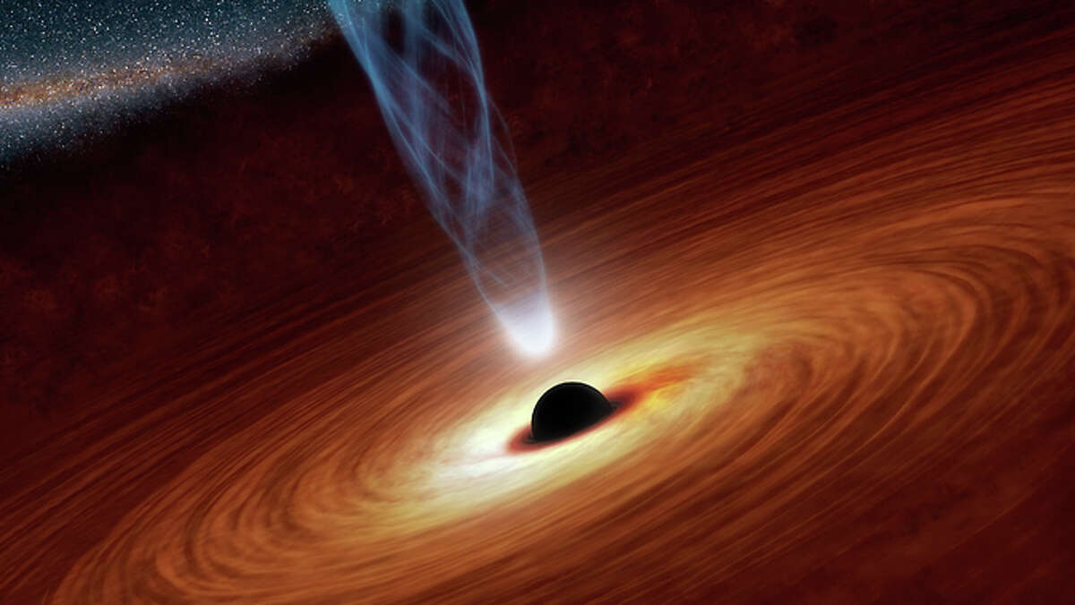 The regions around supermassive black holes shine brightly in X-rays. Some of this radiation comes from a surrounding disk, and most comes from the corona, pictured here in this artist's concept as the white light at the base of a jet. This is one of a few possible shapes predicted for coronas. (Image credit:NASA/JPL-Caltech)