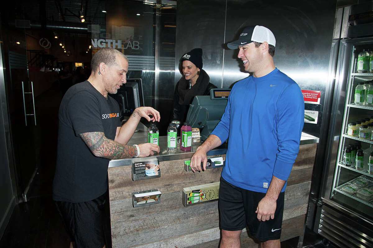Mark Teixeira, right, Yankee first baseman and a Greenwich resident, and an investor in Juice Press, shares a conversation with Marcus Antebi, Juice Press CEO, behind the scenes at one of the company's restaurants.
