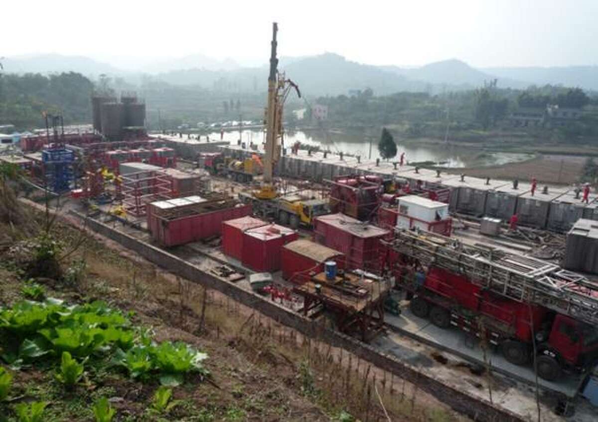 Halliburton s Chinese operations include this one with PetroChina,, using multistage hydraulic fracturing and horizontal wells in Chongqing Province near the nation s largest city. (Halliburton photo.)