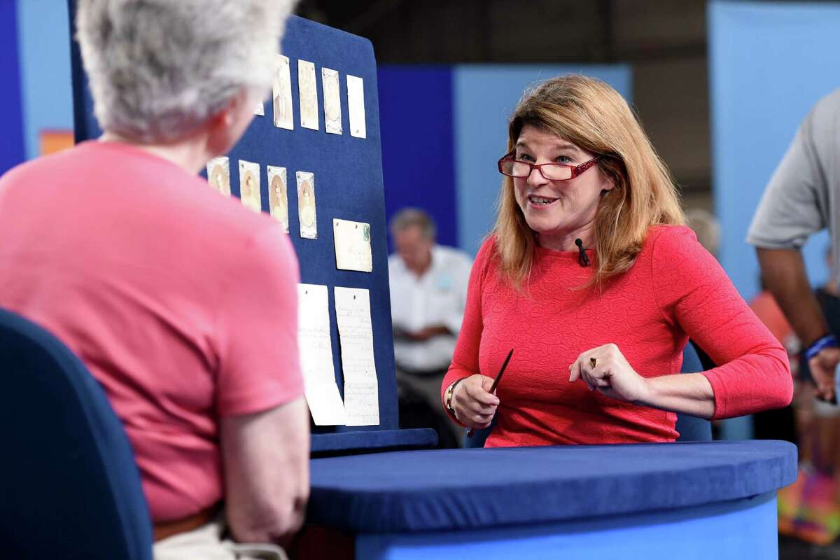 Leila Dunbar appraises an an archive of early Boston baseball memorabilia for $1,000,000 in New York City on August 9, 2014. This is the largest sports memorabilia find in ANTIQUES ROADSHOWâs 19-year history.