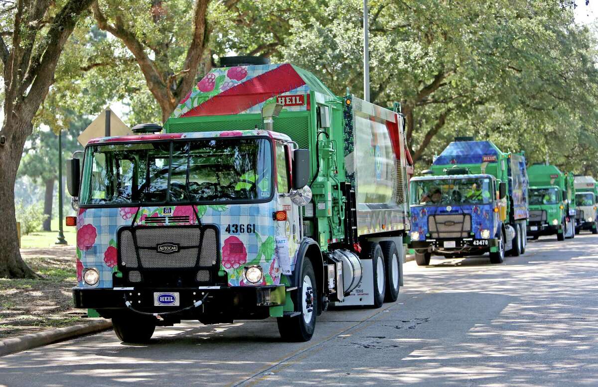 City rolls out artcovered recycling trucks