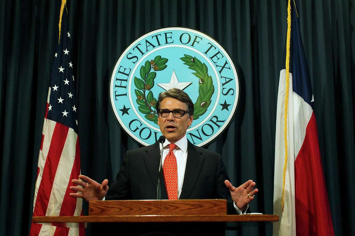 Texas Gov. Rick Perry speaks during a news conference on Saturday, Aug. 16, 2014, in Austin, Texas. Perry said Saturday that the indictment against him was an "outrageous" abuse of power and vowed to fight it.