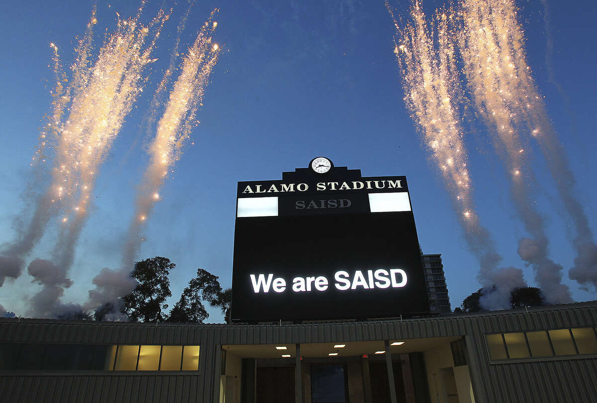 A fireworks display tops off the evening as SAISD officials rededicate the historic Alamo Stadium on Saturday, Aug. 16, 2014. The facility, affectionately known as the Rockpile, has been closed since 2013 for major renovation.