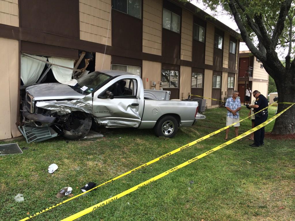 Stolen truck slams into apartment