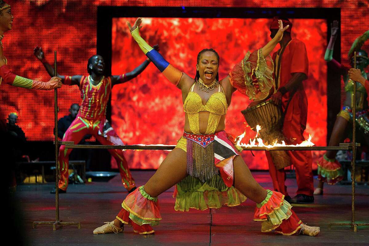 The Caribbean Callaloo from Trinidad performs during the UniverSoul Circus outside Butler Stadium Sunday, Aug. 17, 2014, in Houston.