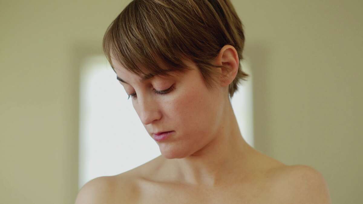 A video still of photographer Sarah Sudhoff from "Surrender," part of the exhibit "Supply and Demand."