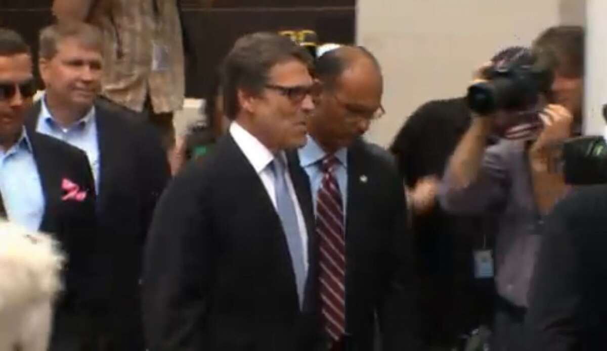 Texas Gov. Rick Perry appears prior to his Aug. 19, 2014 booking in Austin on a charge of abuse of power. | Photo still from Texas Tribune video