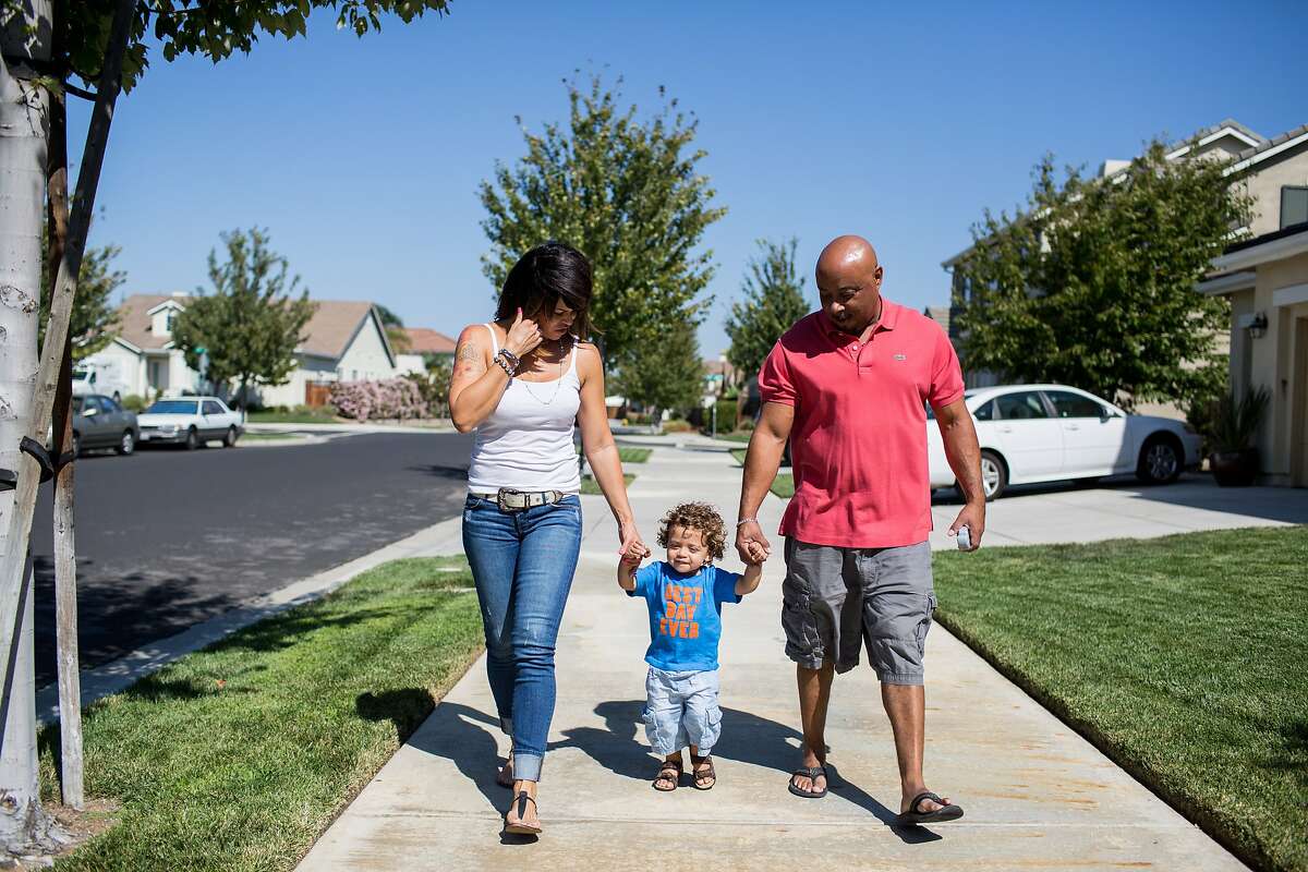 Steavean and Jennifer Taylor with their son Skyelar, who will be turning 2 in October and had a pretty severe form of severe combined immunodeficiency, or SCID, that was caught through the newborn screening process in Brentwood, Calif., Tuesday, August 19, 2014