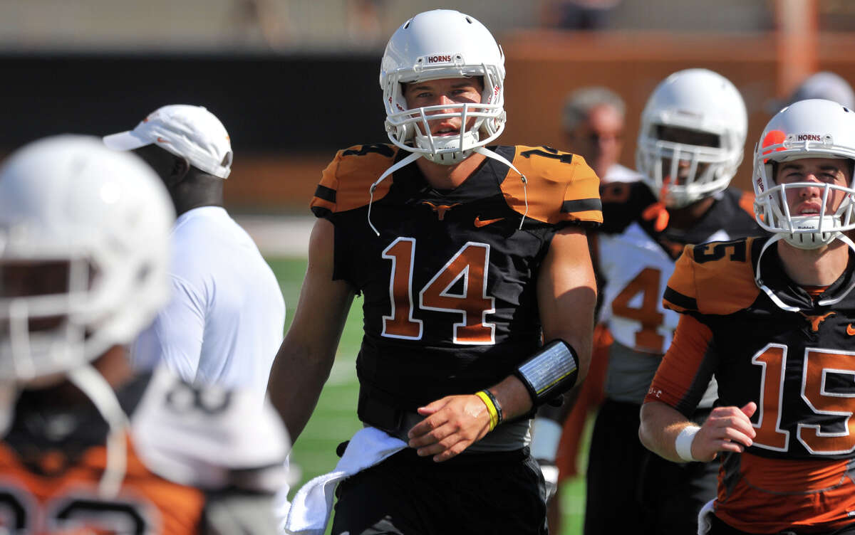 Longhorn football quarterback David Ash during Sunday's UT football practice that was free and open to the public at Darrell Royal Memorial Stadium.