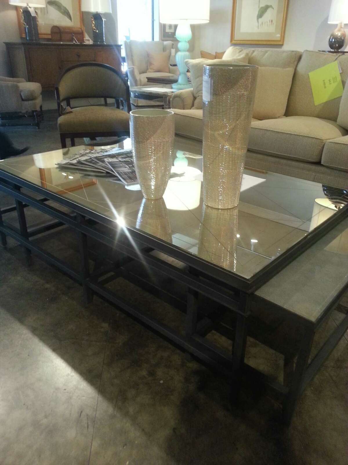 Mirrored coffee table with nesting tables that extend, reg. $3,500, on sale for $1,750 at Bunch & Shoemaker.