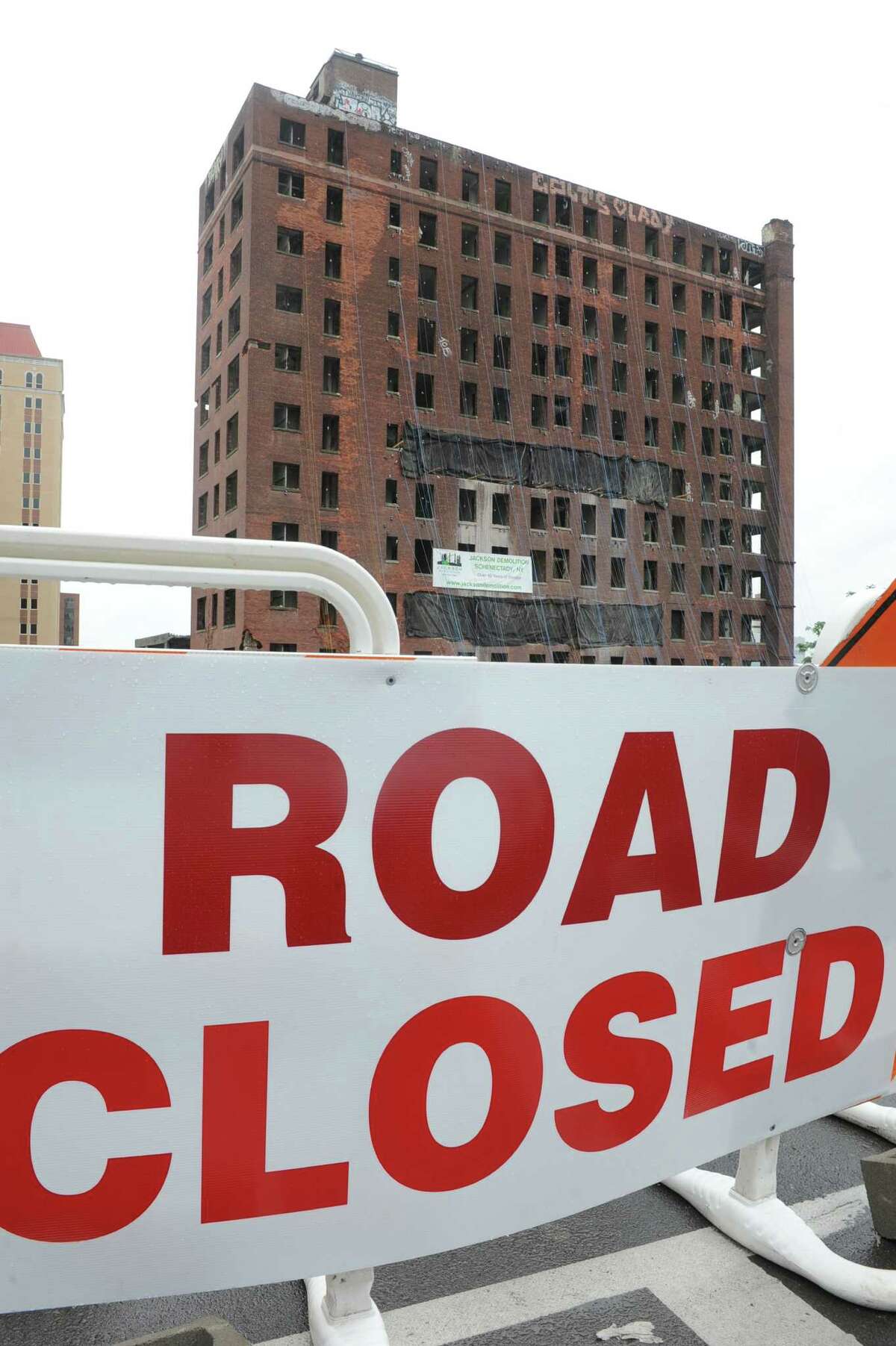 Demolition crews work on getting the Wellington Hotel Annex on Howard Street ready to be imploded Friday afternoon, Aug. 22, 2014, in Albany, N.Y. The building is scheduled to come down Saturday morning at around 9:30. (Lori Van Buren / Times Union)