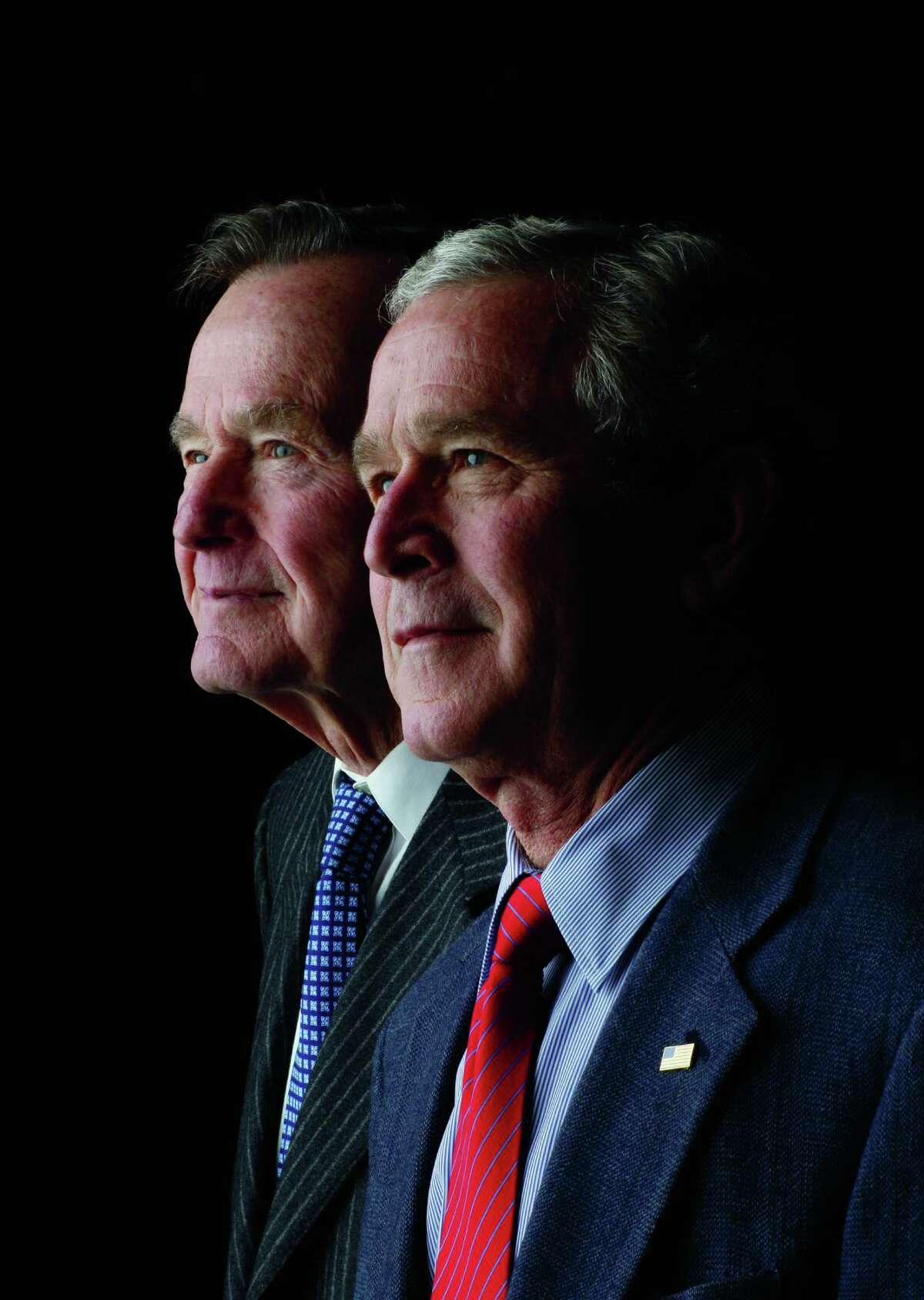 President George W. Bush and former President George H.W. Bush pose for a father-son portrait during the 2008 Easter weekend at Camp David in Thurmont, MD. Photo by Eric Draper, Courtesy of the George W. Bush Presidential Library and Museum