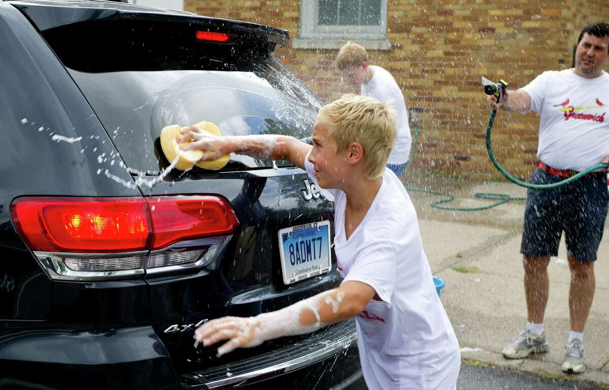 GHS football players hold car wash