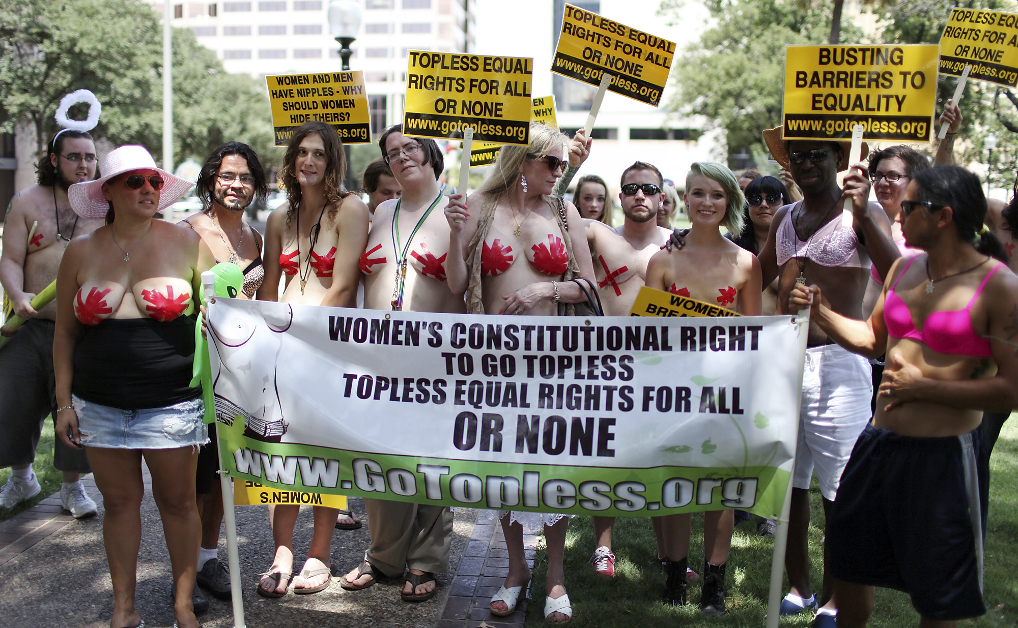 Almost topless women protest for right to bare it all