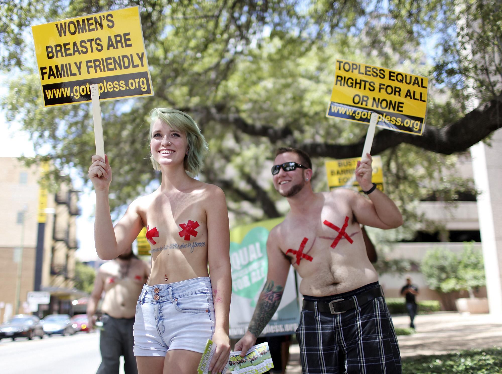 Almost topless women protest for right to bare it all