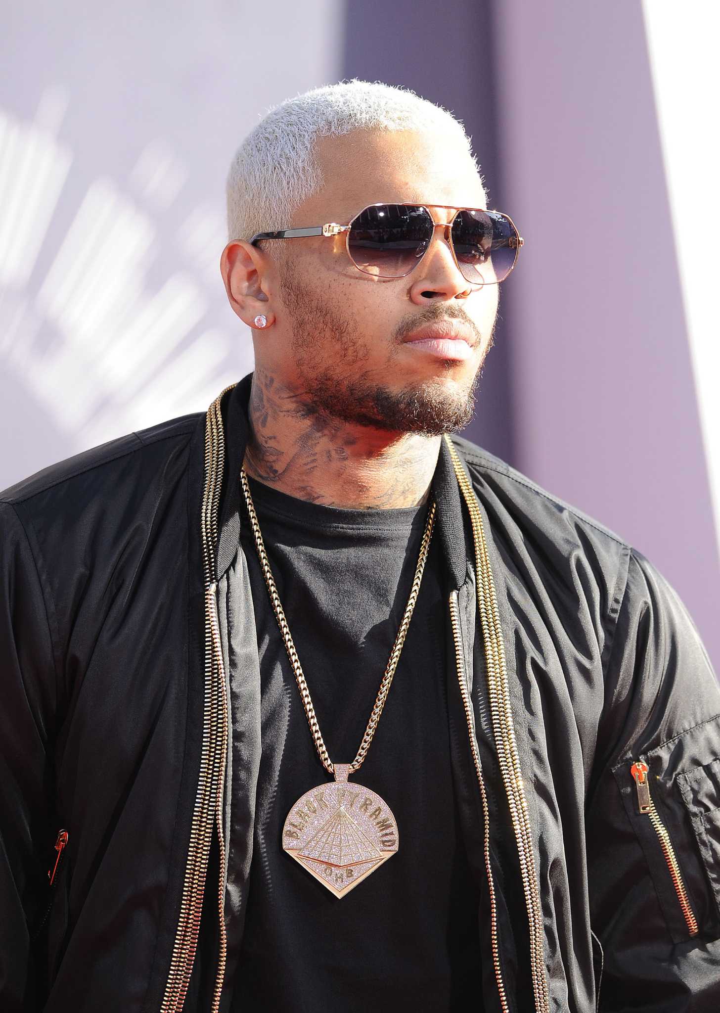 TMZ Releases Video Of Chris Brown Allegedly Pushing Woman In