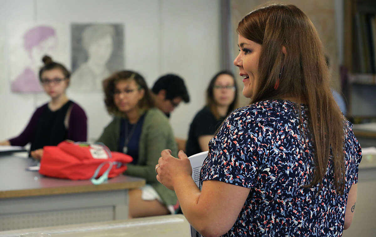 Jill Palone, right, Studio Manager/Faculty of Metals at Southwest School of Art, talks to the first class as the school launches it's new BFA program with a basic design class called Foundations I, with 22 students. Monday, Aug. 25, 2014.