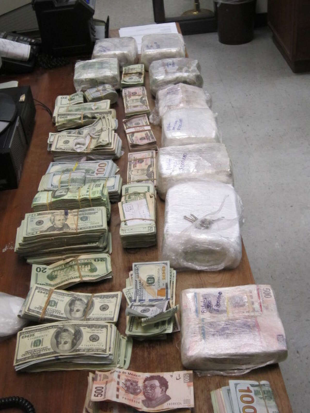 Four abandoned backpacks found by U.S. Border Patrol agents in the Rio Grande Valley Thursday contained more than $650,000 in cash and a kilogram of cocaine.  To see some of the biggest Texas drug busts, click through the slideshow.