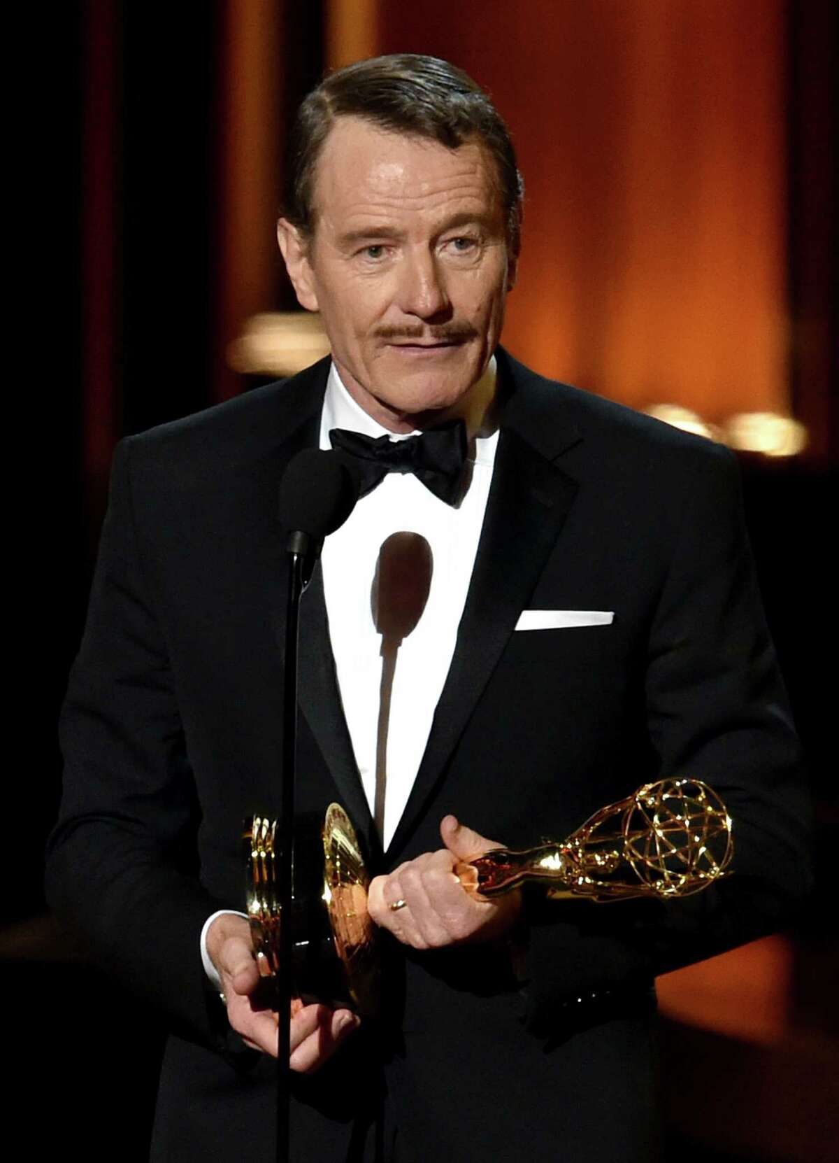 LOS ANGELES, CA - AUGUST 25: Actor Bryan Cranston accepts Outstanding Lead Actor in a Drama Series for 'Breaking Bad' onstage at the 66th Annual Primetime Emmy Awards held at Nokia Theatre L.A. Live on August 25, 2014 in Los Angeles, California. (Photo by Kevin Winter/Getty Images)