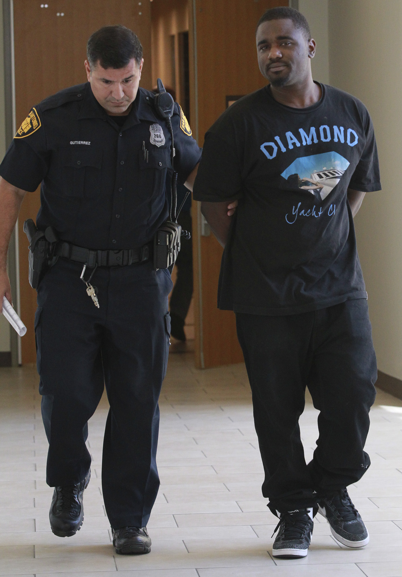 Police arrest man in fatal grocery store shooting
