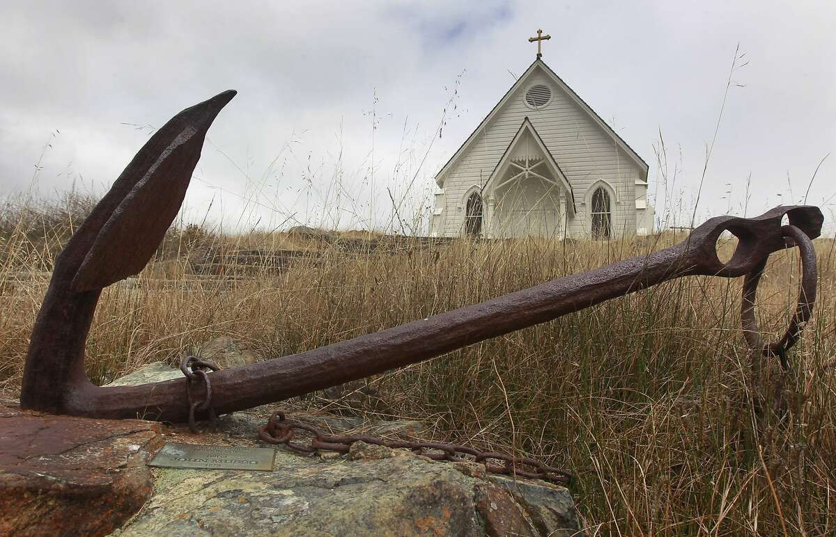 A rusty ship anchor recovered from Tiburon Cove is a permanent fixture in front of the Old St. Hilaryâ€™s church in Tiburon, Calif. on Tuesday, Aug. 19, 2014.