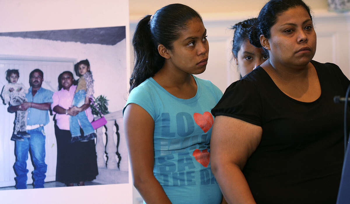 The family of Guillermo Arevalo Pedraza reacts during a press conference in Laredo announcing their lawsuit against the United States of America, including former Department of Homeland Security Secretary Janet Napolitano, Wednesday, August 27, 2014. From left are daughters, Priscilla Arevalo Lam, 11, Mariana Arevalo Lam, 10 and his wife, Nora Isabel Lam Gallegos, 27. On September 3, 2012, Arevalo was barbecuing with his family along the Rio Grande in Nuevo Laredo when he was shot and killed by U.S. Border Patrol agents attempting to stop a young man from swimming into the U.S. In a statement issued by Border Patrol, the agents defended themselves after the crowd on the Mexican side began throwing rocks. According to their attorney Robert Hilliard, the family is seeking $40 million.