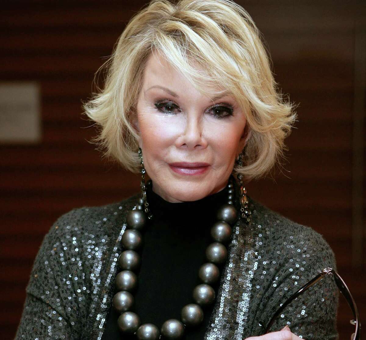 FILE Comedian Joan Rivers Hospitalised After She Stops Breathing Following An Operation On Her Vocal Chords SYDNEY, AUSTRALIA - MARCH 05: International Guest Joan Rivers attends the 2009 Mardi Gras VIP party at the Zeta Bar of the Hilton Hotel on March 5, 2009 in Sydney, Australia.