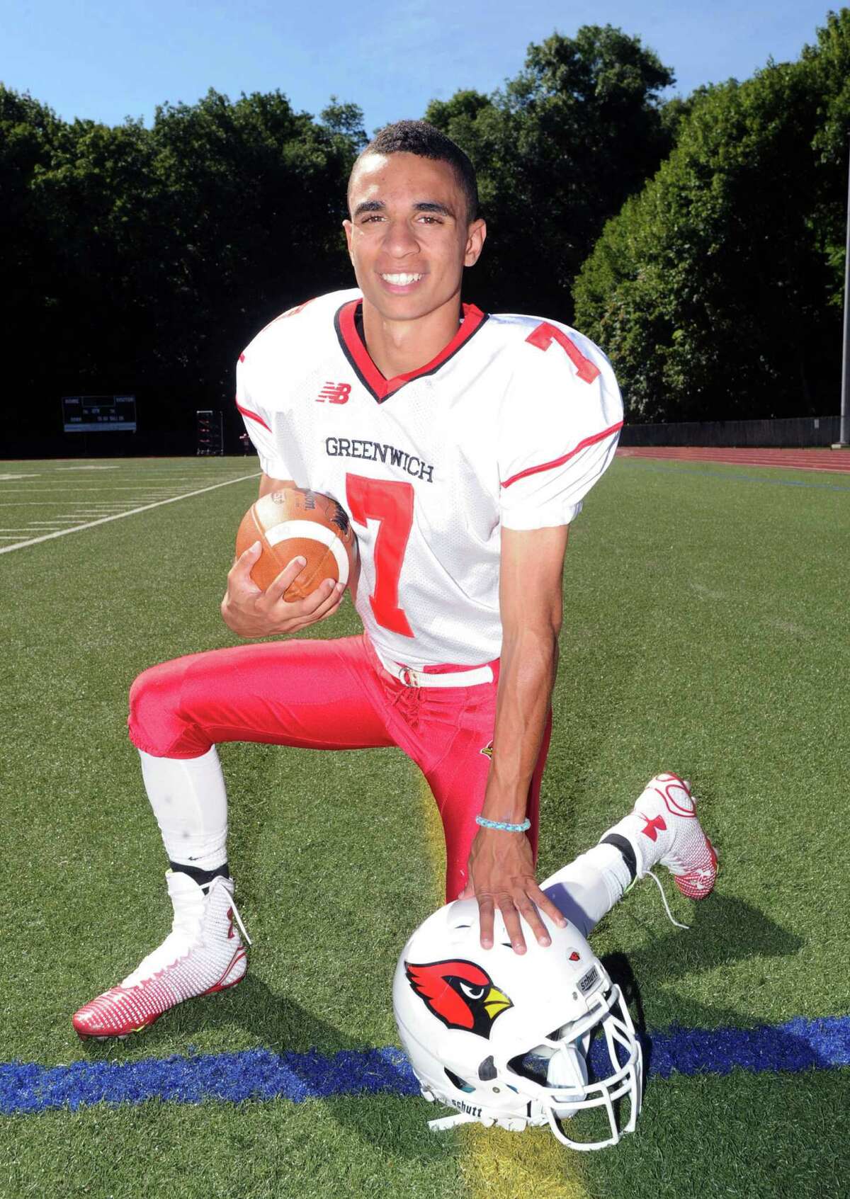 Greenwich High School football player, Austin Longi, a captain, during picture day at Cardinal Stadium in Greenwich, Conn., Friday, Aug. 29, 2014.