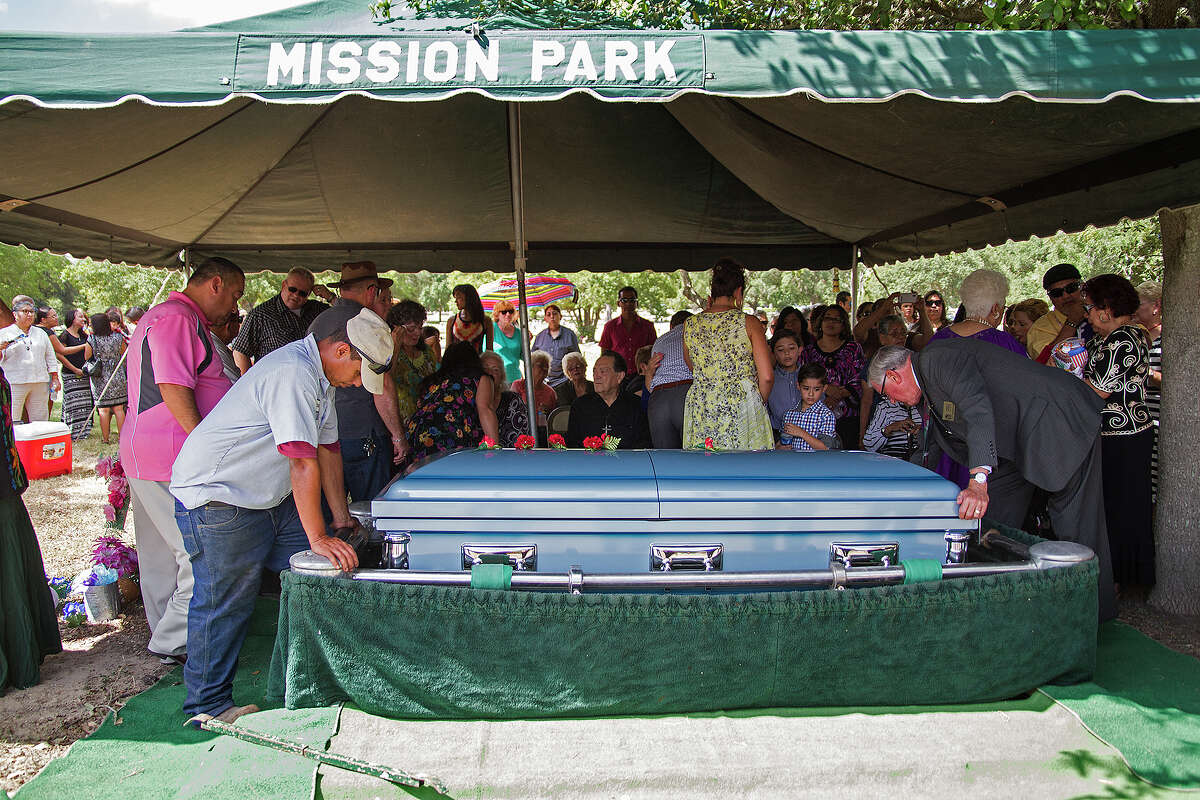Janet Cortez is laid to rest at Mission Burial Park South, Saturday, Aug. 30, 2014. Cortez is known to her fans as La Perla Tapatia and a member of the singing group Las Tesoros.