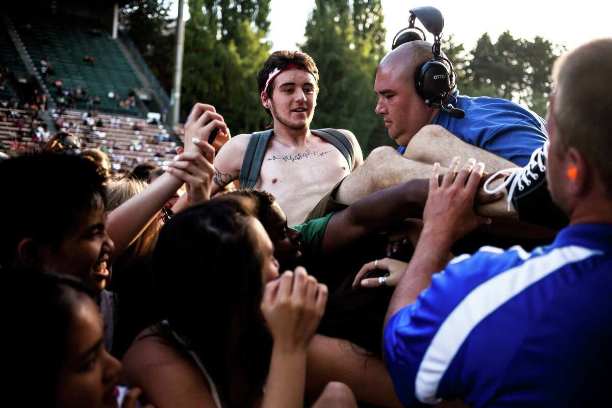 Attendees pack in to listen to J. Cole on the third and final day of Bumbershoot, Seattle's annual music and arts festival, photographed Monday, September 1, 2014, in Seattle, Washington.