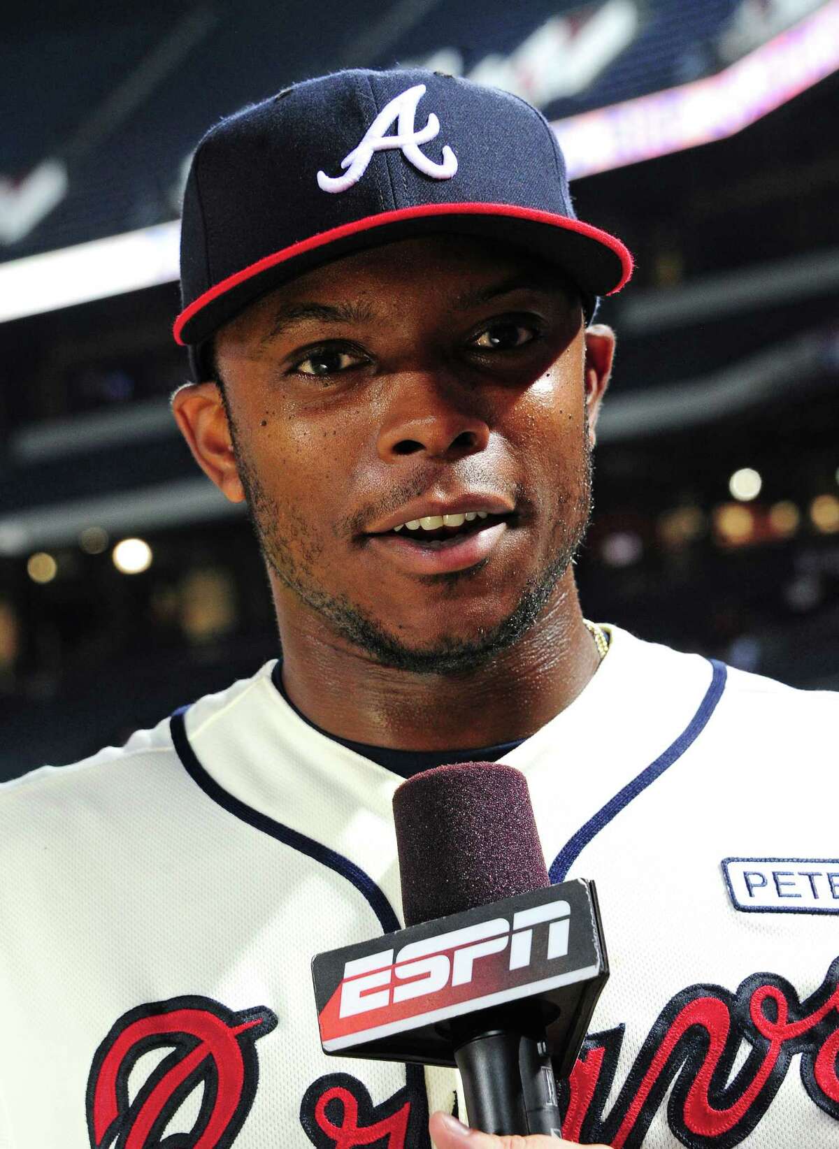 ATLANTA, GA - AUGUST 10: Justin Upton #8 of the Atlanta Braves is interviewed after the game against the Washington Nationals at Turner Field on August 10, 2014 in Atlanta, Georgia. (Photo by Scott Cunningham/Getty Images)