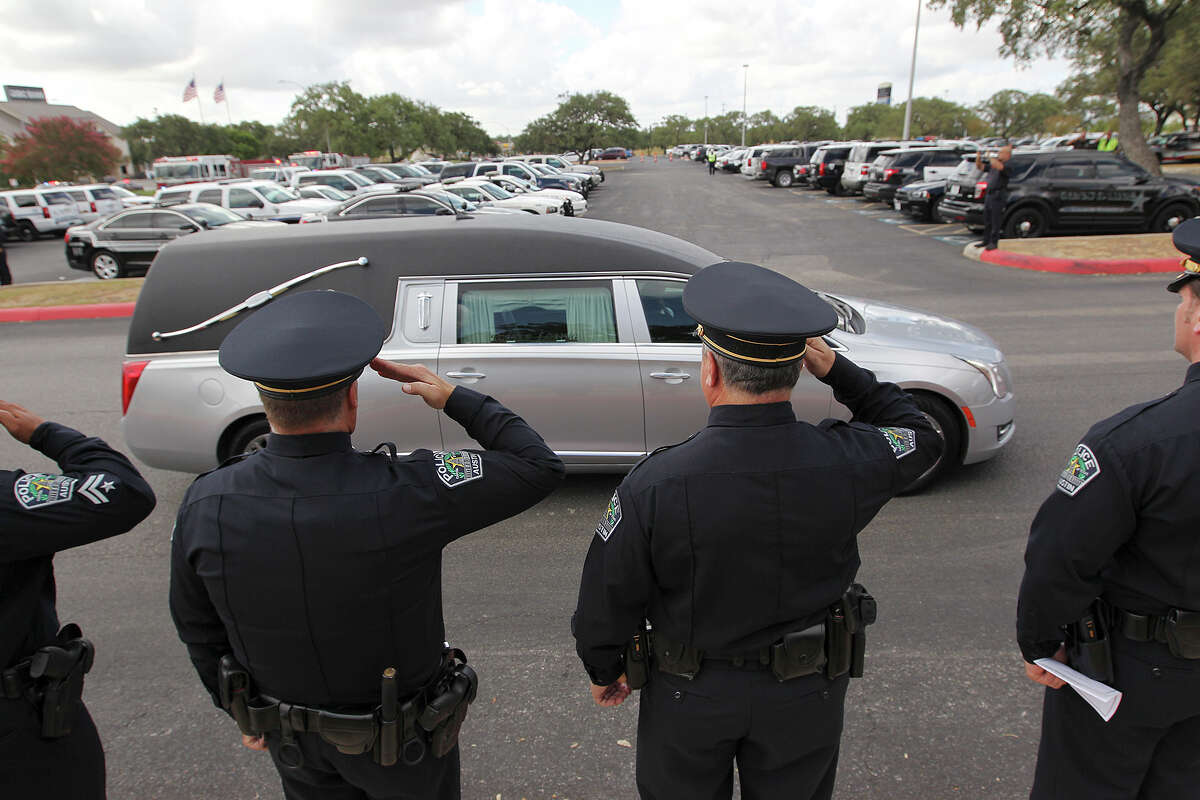 Hundreds remember slain Elmendorf chief