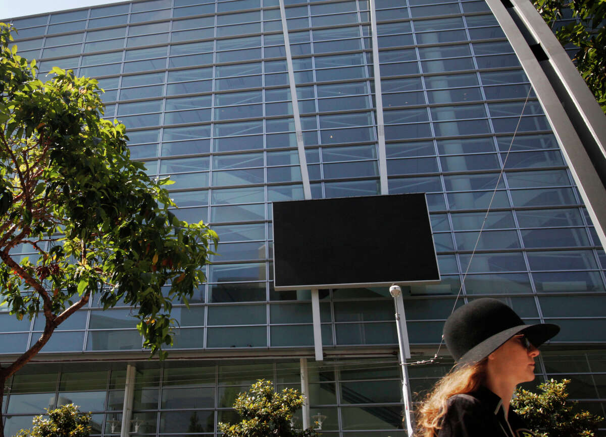 The installation “Facsimile,” on the facade of Moscone Center West, transfixes observers when it’s working, but has had problems remaining operational. The city says it must come down.