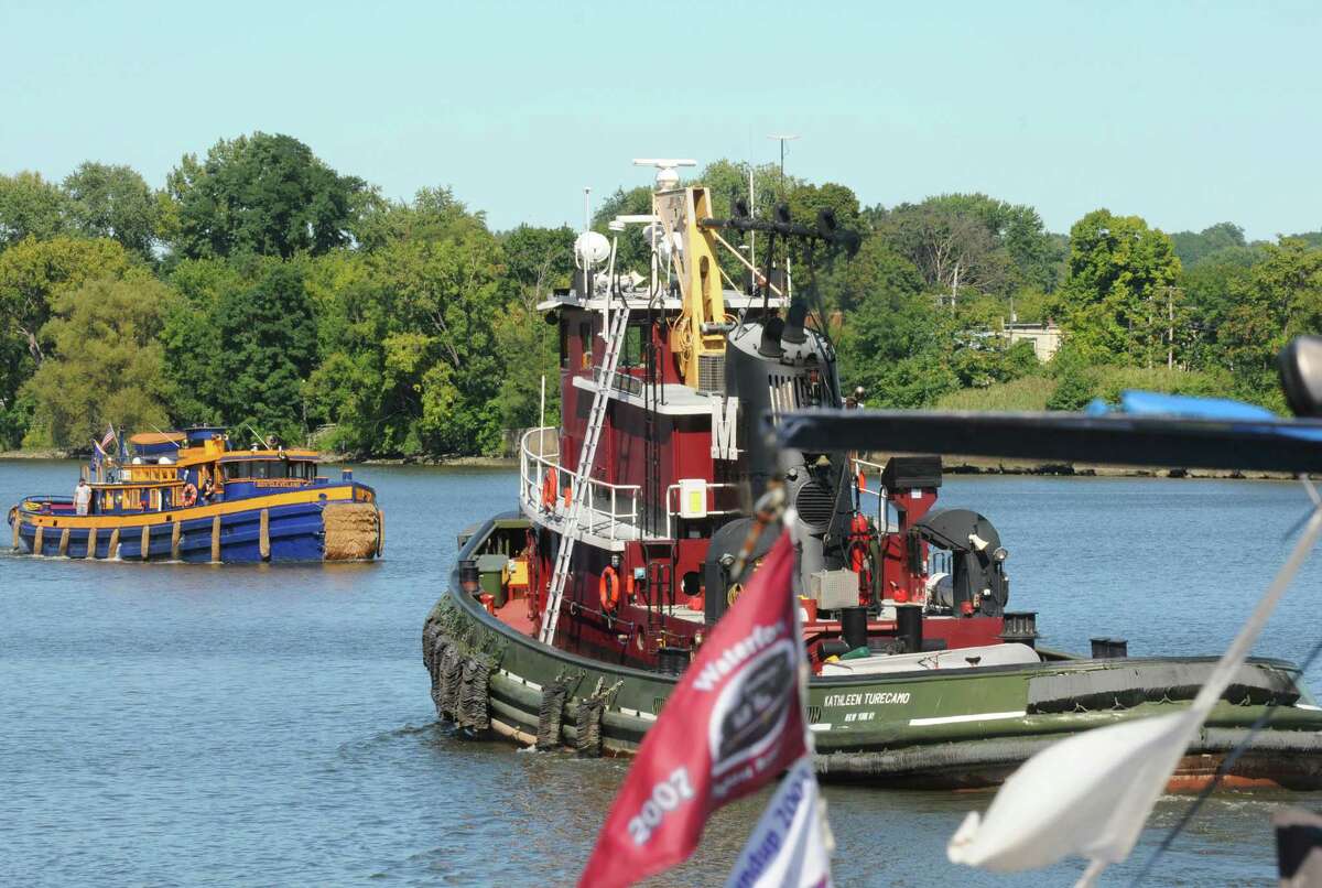 Tugboats gather in the Port of Albany to parade up the Hudson River toward Waterford in the annual tug parade on Friday Sept. 6, 2013 in Albany, N.Y. (Michael P. Farrell/Times Union)