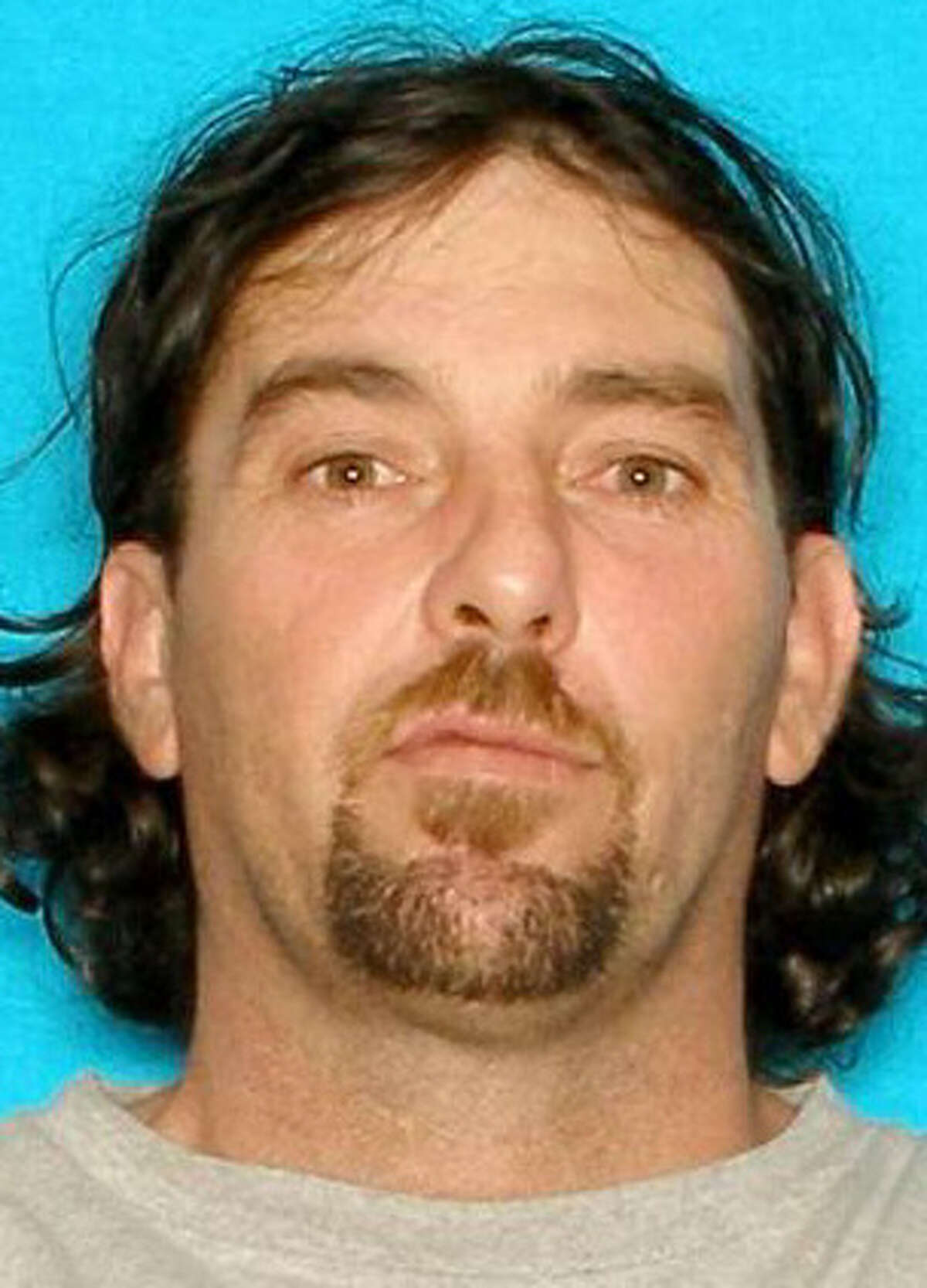 Daniel Goodwin, 41, seen in an undated driver's license photo, was shot in the chest at a 2012 family barbecue.