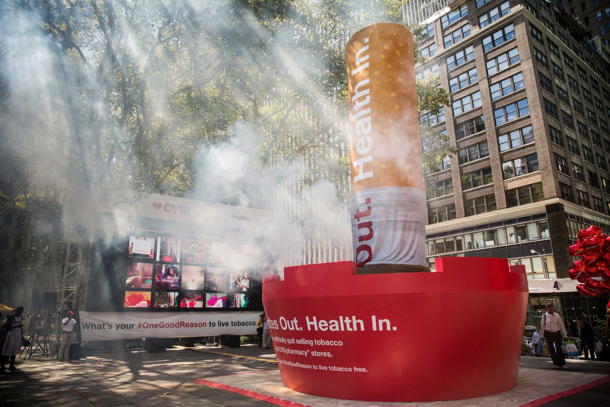 CVS changes name, stops tobacco sales early
