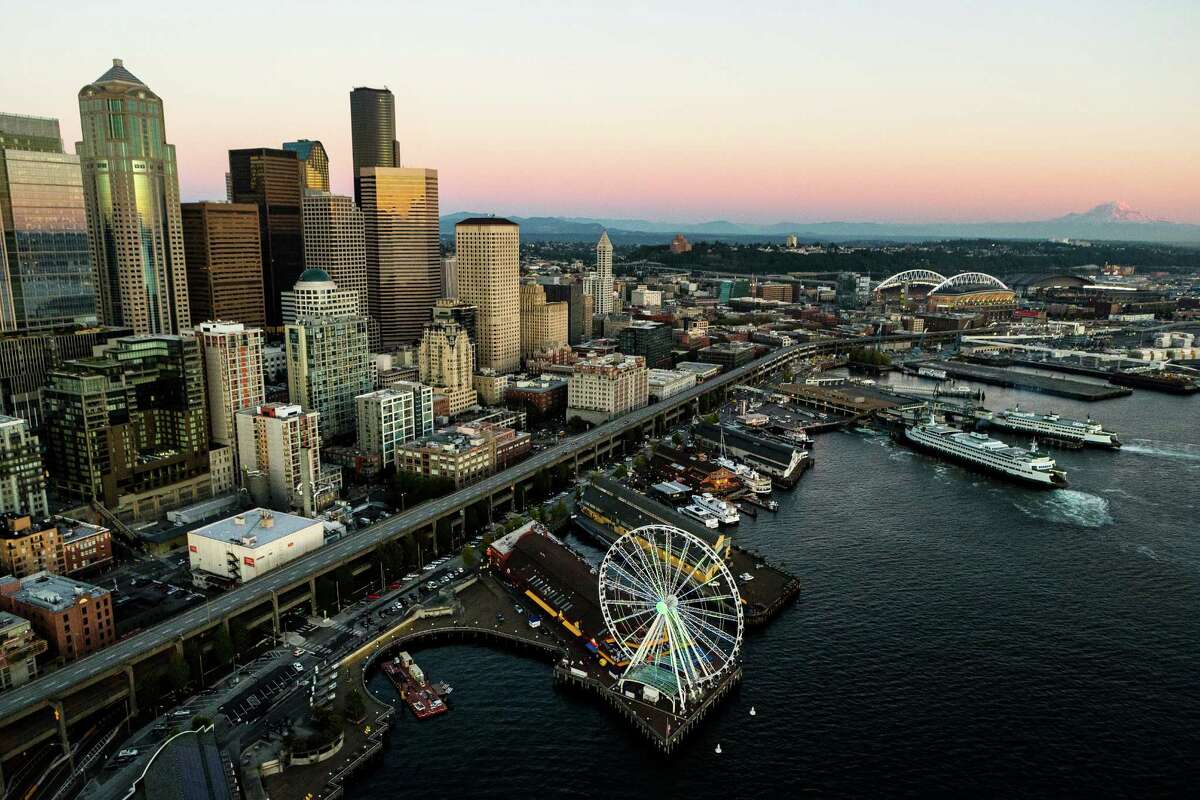 An aerial view over Seattle on the evening of the Seahawks' season opener against the Green Bay Packers, Thursday, Sept. 4, 2014.
